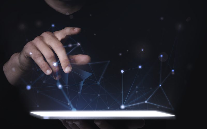 Man using digital tablet psd mockup smart technology