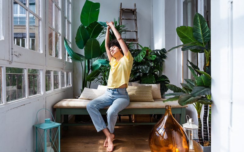 Beautiful latino young woman at home - Pretty south american with curly hair female portrait, lifestyle and domestic life scene