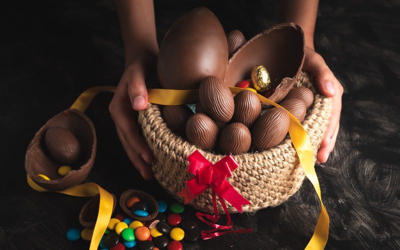 basket of chocolate Easter eggs, large and small with sprinkles